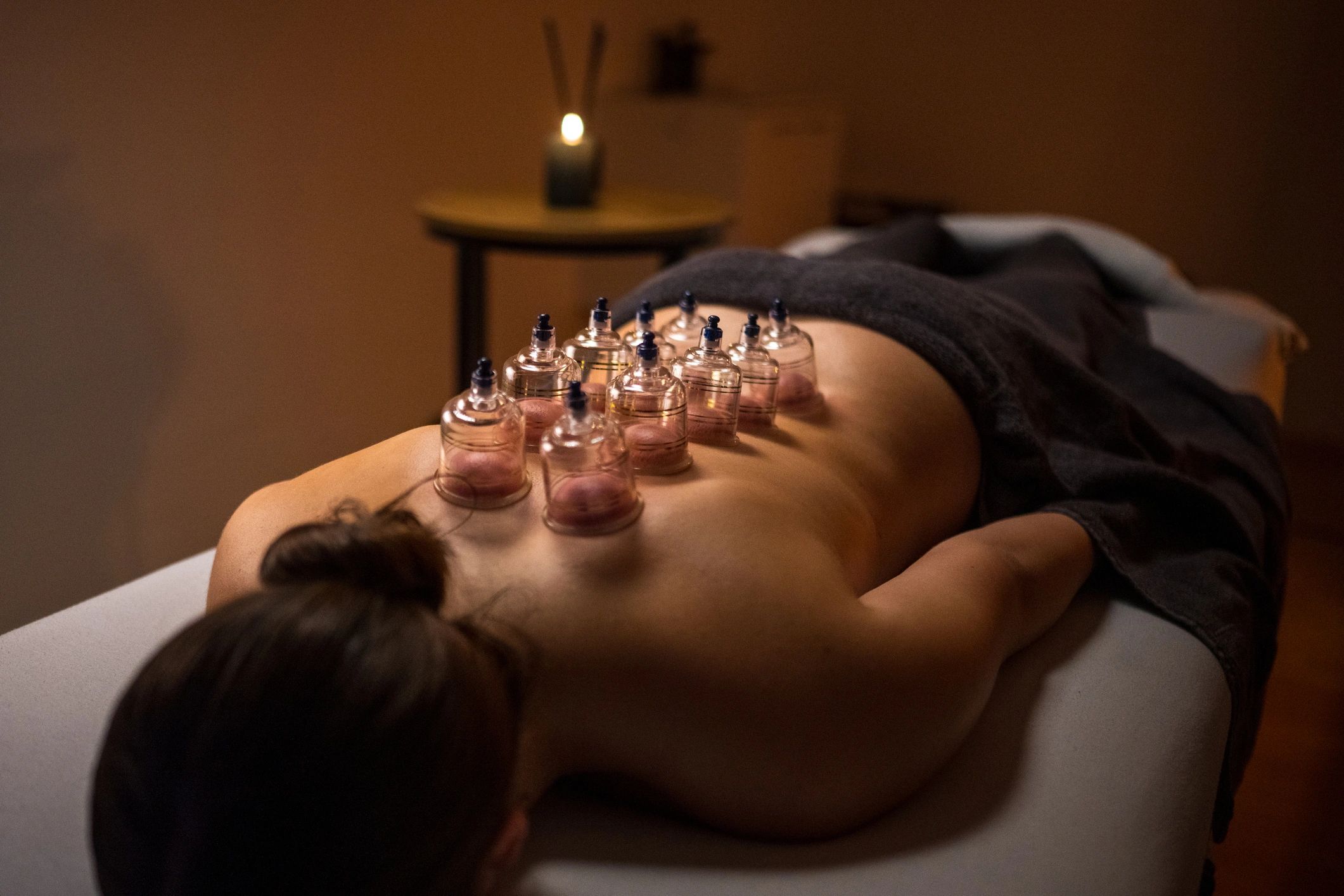 Spa treatment in a dimly lit wellness room